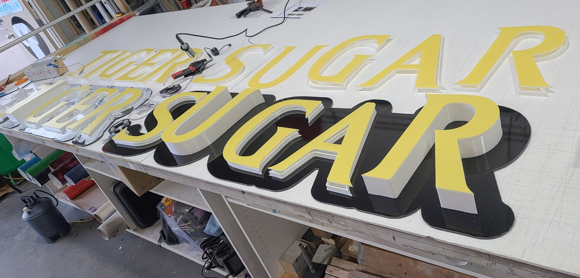 Innovative Sign Redesign: Saves Money - Wraptor Signs & Graphics
